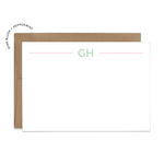 Image of a white flat note card with a kraft brown envelope. The card features a two mint lines with example initials in the middle of the lines.