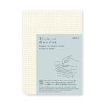 An image of a Japanese notepad with graph paper