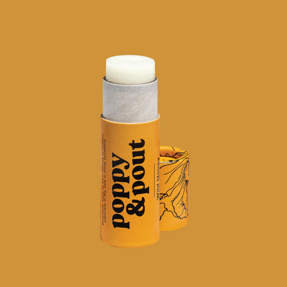 An image of an open golden yellow lip balm tube with text "poppy and pout" on a golden yellow background 