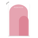 A notepad with text that reads "Alexis Rose" and an illustration of two pink arches overlapping
