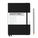 An image of a black Leuchtturm notebook with lined pages and a silver pencil
