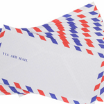 Image of pile of nine envelopes with red, white and blue striped border with text "via air mail" in all caps on the left side on white background